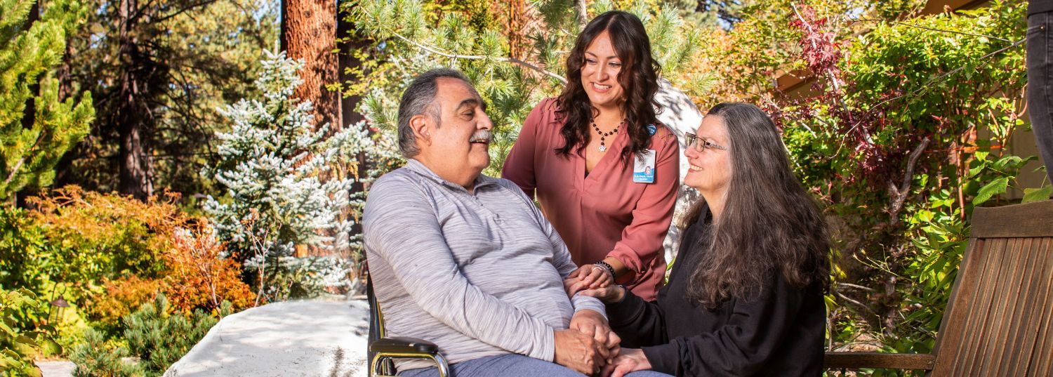 Family outside of Barton's Skilled Nursing Facility.